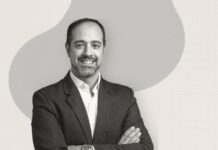 Seguradoras concentram 72% dos investimentos em IA na tecnologia e apenas 28% na gestão da mudança, aponta Capgemini Gustavo Leança, Diretor de Soluções para Seguros da Capgemini Brasil, de braços cruzados, em retrato de divulgação